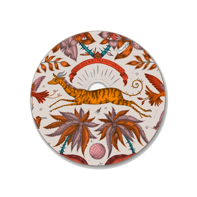 Decorative coaster with an African gazelle design surrounded by tropical elements on a beige background
