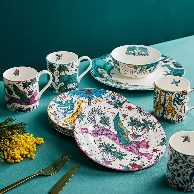  The Explorer Dinner Set designed by Emma J Shipley, crafted in fine bone china by skilled artisans in Stoke on Trent UK, hand decorated with an exquisitely detailed and colourful design featuring leopard spotted elephants, a leaping gazelle, soaring hornbills in layers of teal, greens and neutrals, part of the Fine China Dining collection