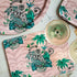 Pink | Medium | 4 | The Lemur Pink Placemat featuring the madagascan Lemur, palm trees and leafy foliage, designed and drawn by Emma J Shipley
