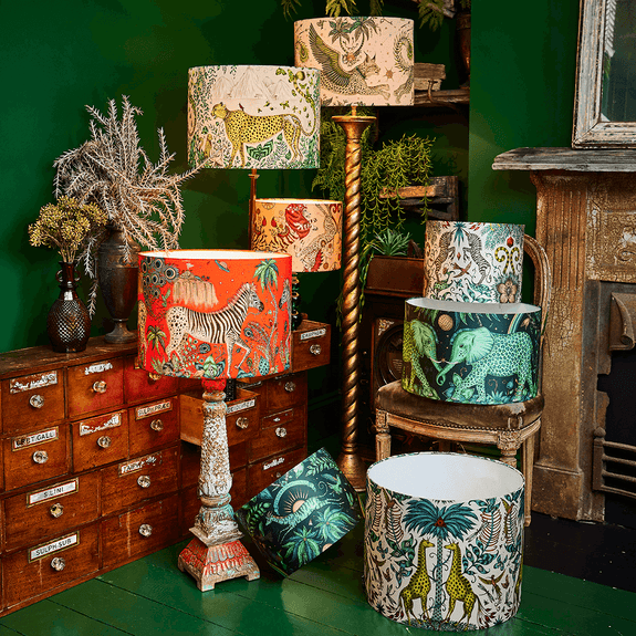 Our enchanting collection of luxury silk lampshades designed by Emma J Shipley featuring a menagerie of designs including the Cheetah Silk Lampshade in golden yellow and green tones