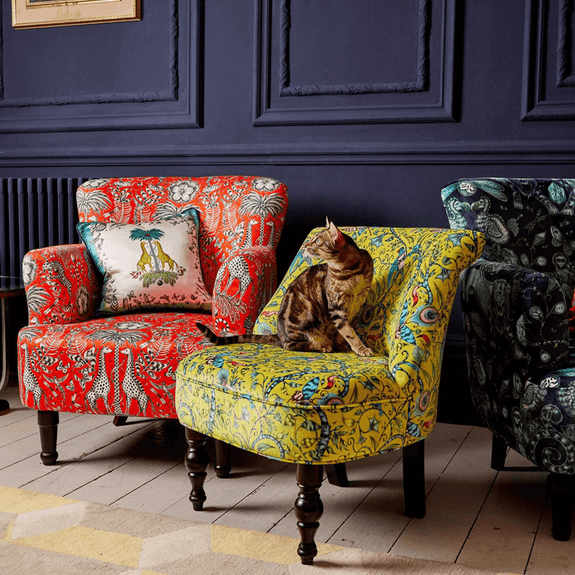Lime | The charming Rousseau design from the Animalia collection appears here with other designs from the collection, designed by Emma J Shipley with Clarke & Clarke.