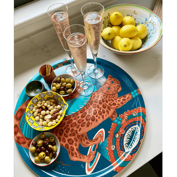 Teal | Medium | The Snow Leopard Teal round tray in medium designed by Emma J Shipley in her London Studio features a vibrant red and orange Snow Leopard in the centre with a fiery tail
