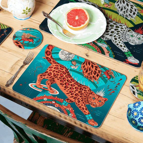 Teal | The Teal Snow Leopard placemat with the Teal coaster featuring a rust red winged lion on the front, designed by Emma J Shipley and made with Jamida