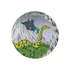 1 | Round coaster with a loch ness monster and castle design on a grey background.
