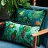Aqua | Detail photo of Quetzal Luxury Velvet Bolster Cushion in Aqua and Square in Teal on a chair 