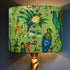Jungle | Quetzal Silk Lampshade in Jungle lit up inspired by Costa Rica Cloud Forest designed by Emma J Shipley in London