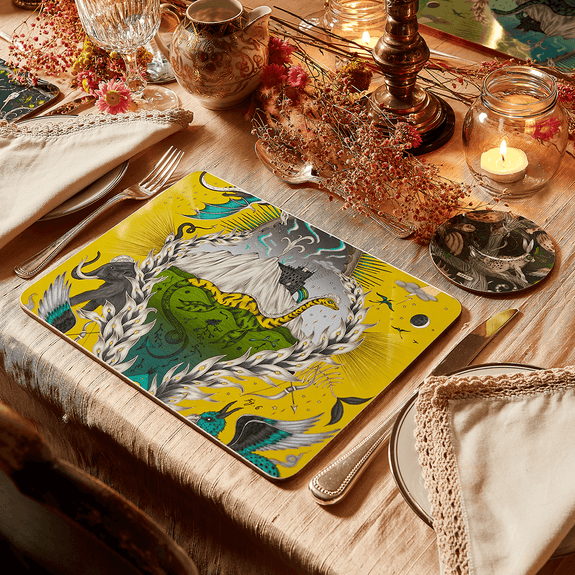 Medium | Large| 1 | 4 | Decorative placemat with animal design on a table setting with candles and cutlery.
