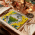 Medium | Large| 1 | 4 | Decorative placemat with animal design on a table setting with candles and cutlery.