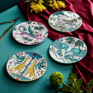 The Explorer Side Plates set of four by Emma J Shipley: Kruger, Zambezi, Lynx and Lost World fine bone china side plates