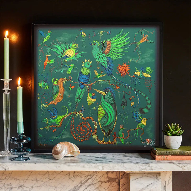 The Quetzal Silk Framed Artwork in Teal on a mantelpiece designed by Emma J Shipley in London