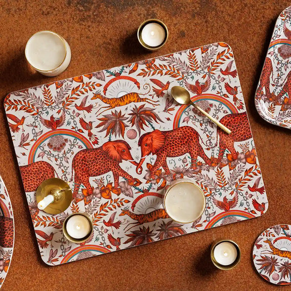 Medium | Large | 1 | 4 | Decorative placemat with red orange elephants, birds, and other animals on a white background
