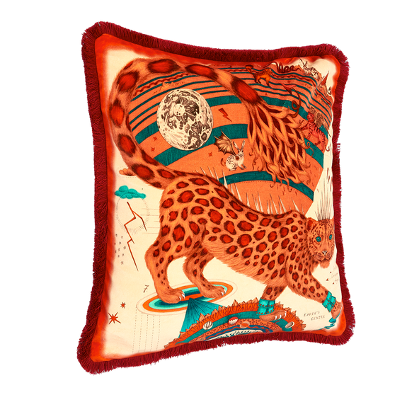 Flame | The Snow Leopard Luxury Velvet Cushion in Flame, featuring vibrant oranges, flame reds and striking blues with opulent ruche fringing. Designed by Emma J Shipley, inspired by Dante’s Inferno and Paradiso from the 14th century and Ingmar Bergman’s film “The Seventh Seal