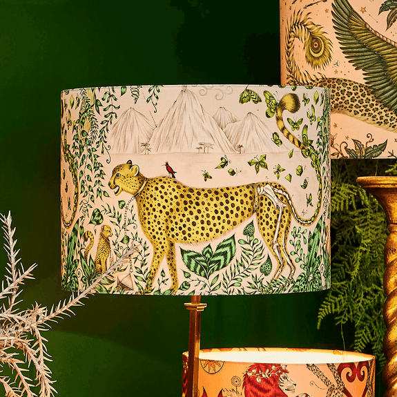 The warm glow of the Cheetah silk lampshade shows of the enchanting details like the green leaf foliage, the baby cub cheetah and the insects, this enchanting piece will bring a warm glow to your home