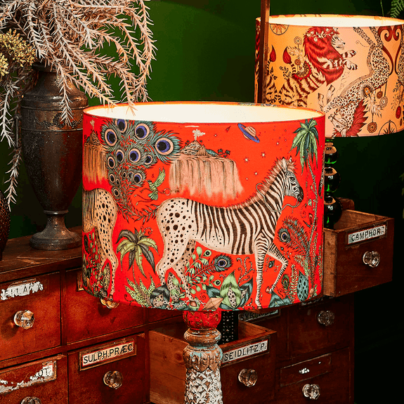 The Lost World Red silk lampshade is the perfect piece to bring in enchanting maximalist lighting into your home, with 2 curious zebras on the front this design is a real statement piece