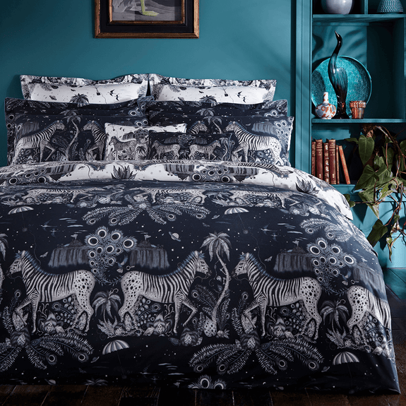 Navy/White | The Lost World Duvet in Navy and Blue, is inspired by a Zebra safari. Printed onto a 200 thread count cotton sateen reversible duvet case with the colours Navy which is a deep and dark look or the Blue Monochrome with is a lighter fresher tone.