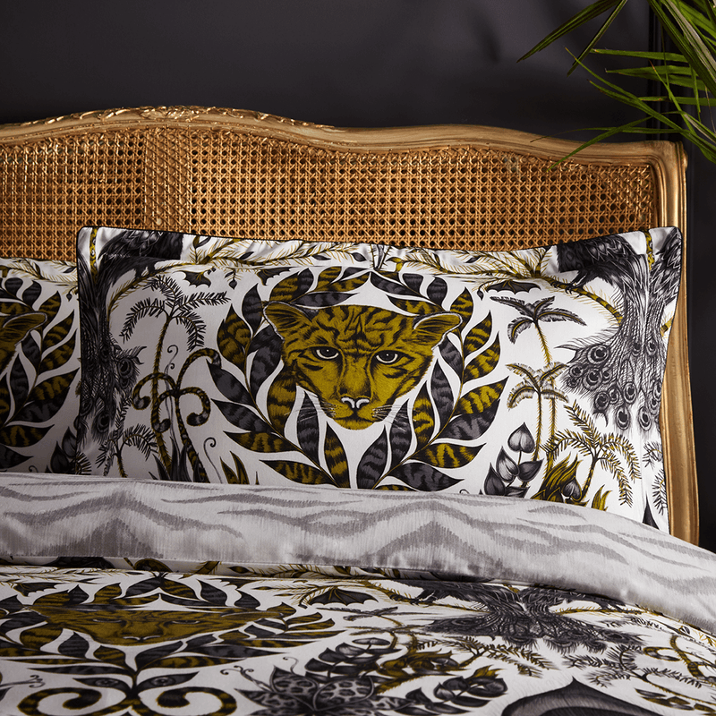  The Amazon Gold Oxford pillowcase have a magical jaguar face in the centre surrounded by twisting folliage