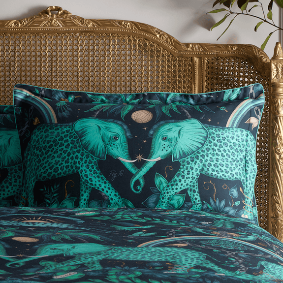 Teal/White | The Teal side of the oxford pillowcase by maximalist homeware designer Emma J Shipley the perfect bedding set with the elephants on the front with interior experts Clarke & Clarke