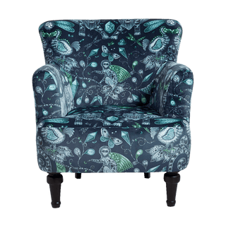 Front view of the Extinct Dalston Chair by Emma J Shipley for Clarke & Clarke is a stunning armchair which makes a bold statement in your interior