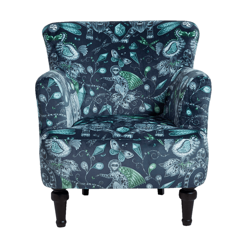   Front view of the Extinct Dalston Chair by Emma J Shipley for Clarke & Clarke is a stunning armchair which makes a bold statement in your interior