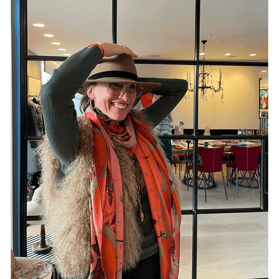 Autumn - Orange | Amanda in the Lynx Autumn Scarf to better show how it looks on and one of the many ways you can style the Emma J Shipley X Red Leopard collection