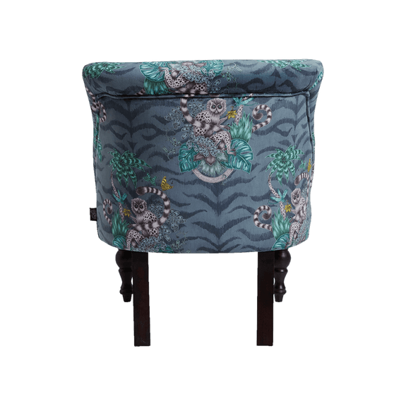 Navy | The striking velvet Lemur Langley Chair designed by Emma J Shipley for Clarke & Clarke is a beautiful navy and green and blue upholstered chair with our Animalia fabric