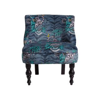 This exotic occasion chair is designed by Emma J Shipley in collaboration with Clarke & Clarke. The Lemur Langley chair features the beautiful Lemur velvet navy fabric and an enchanting design of a curious lemur