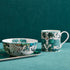 Zambezi Bowl, Mug and Tray designed by Emma J Shipley, crafted in fine bone china by skilled artisans in Stoke on Trent UK, hand decorated with an exquisitely detailed and colourful design featuring leopard spotted elephants, a leaping gazelle, soaring hornbills in layers of teal, greens and neutrals, part of the Fine China Dining collection