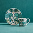 1 | Zambezi Side plate and mug designed by Emma J Shipley, crafted in fine bone china by skilled artisans in Stoke on Trent UK, hand decorated with an exquisitely detailed and colourful design featuring leopard spotted elephants, a leaping gazelle, soaring hornbills in layers of teal, greens and neutrals, part of the Fine China Dining collection
