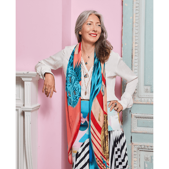 Spring - Turquoise | Tarra in the Spring scarf which brings out the warm undertones in her skin and enhances her look, designed by Emma J Shipley with the Red Leopard colour palettes